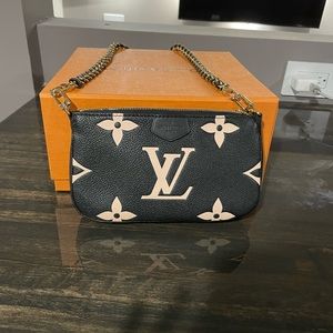 Louis Vuitton 2021 Bicolor Monogram Empreinte Pochette